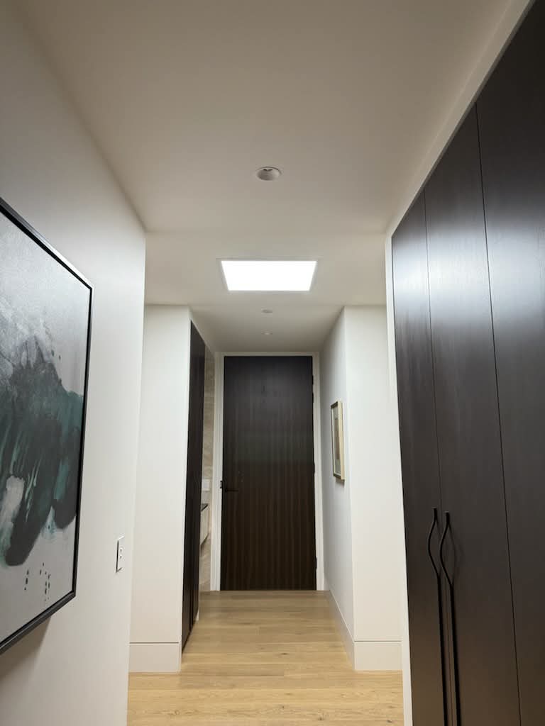 Hallway brightened with Illume solar skylight by PHOSLUX